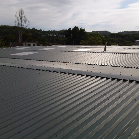 Gutter Lining Replacement and Oversheeting Roof to NHS Medical Records Building Devon
