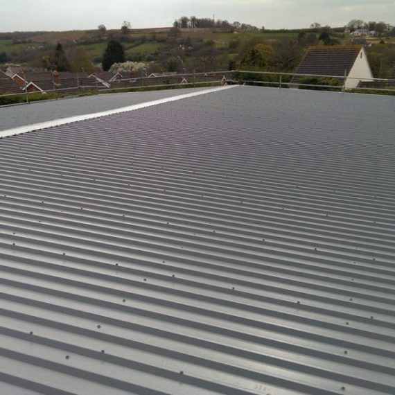 Industrial Roofing - Oversheeting Roof to Retail Outlet in Devon