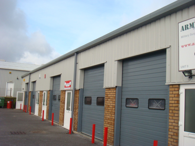 Replacement of Industrial Wall Cladding and Repainting Sectional Doors, Cornwall
